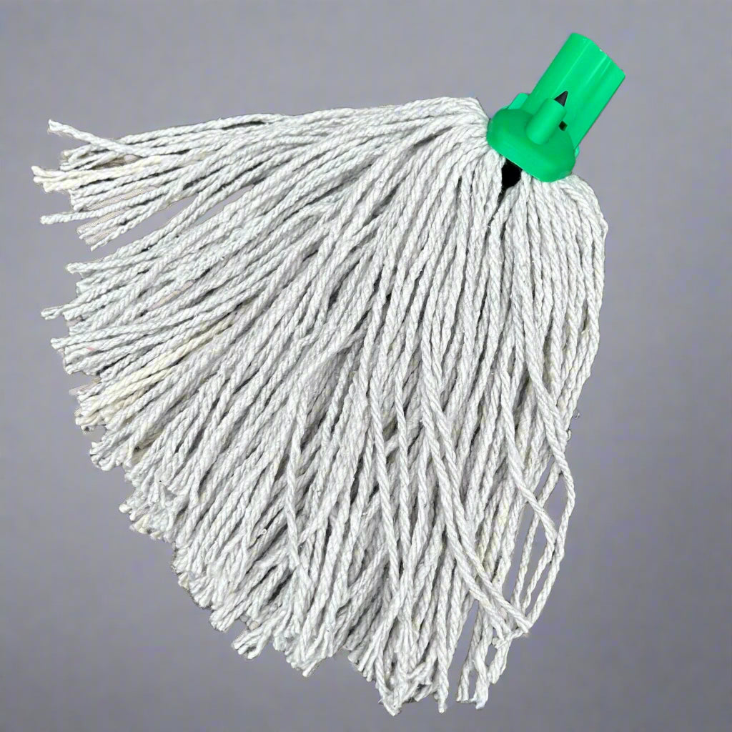 A green mop head displayed on a wooden bench