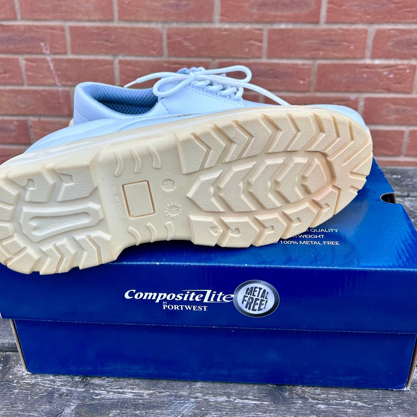 Size 10 Composite light (white ) Safety shoes - Cleaning Products UK