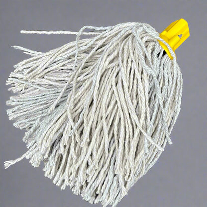 A yellow mop head displayed on a wooden bench